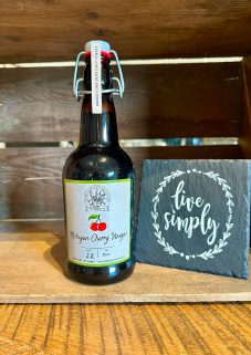 A bottle of Donkey Provisions Michigan Cherry Vinegar
